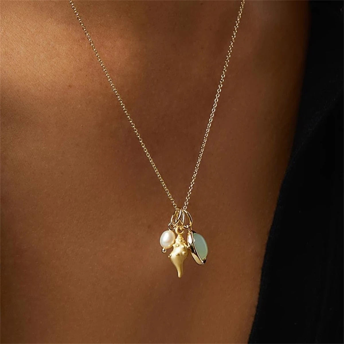 Gold seashell necklace