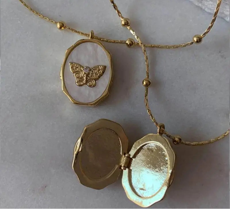 Butterfly locket necklace