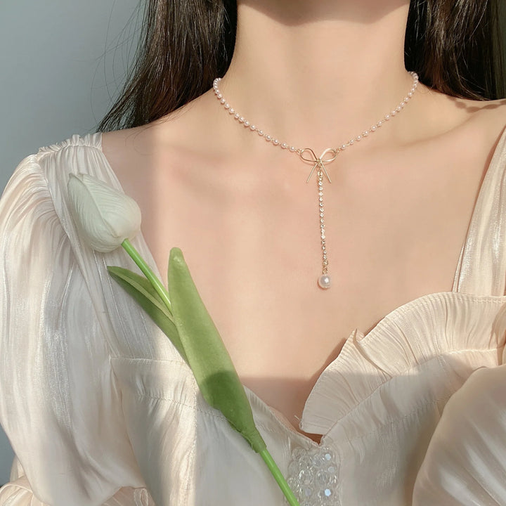 Butterfly pearl necklace