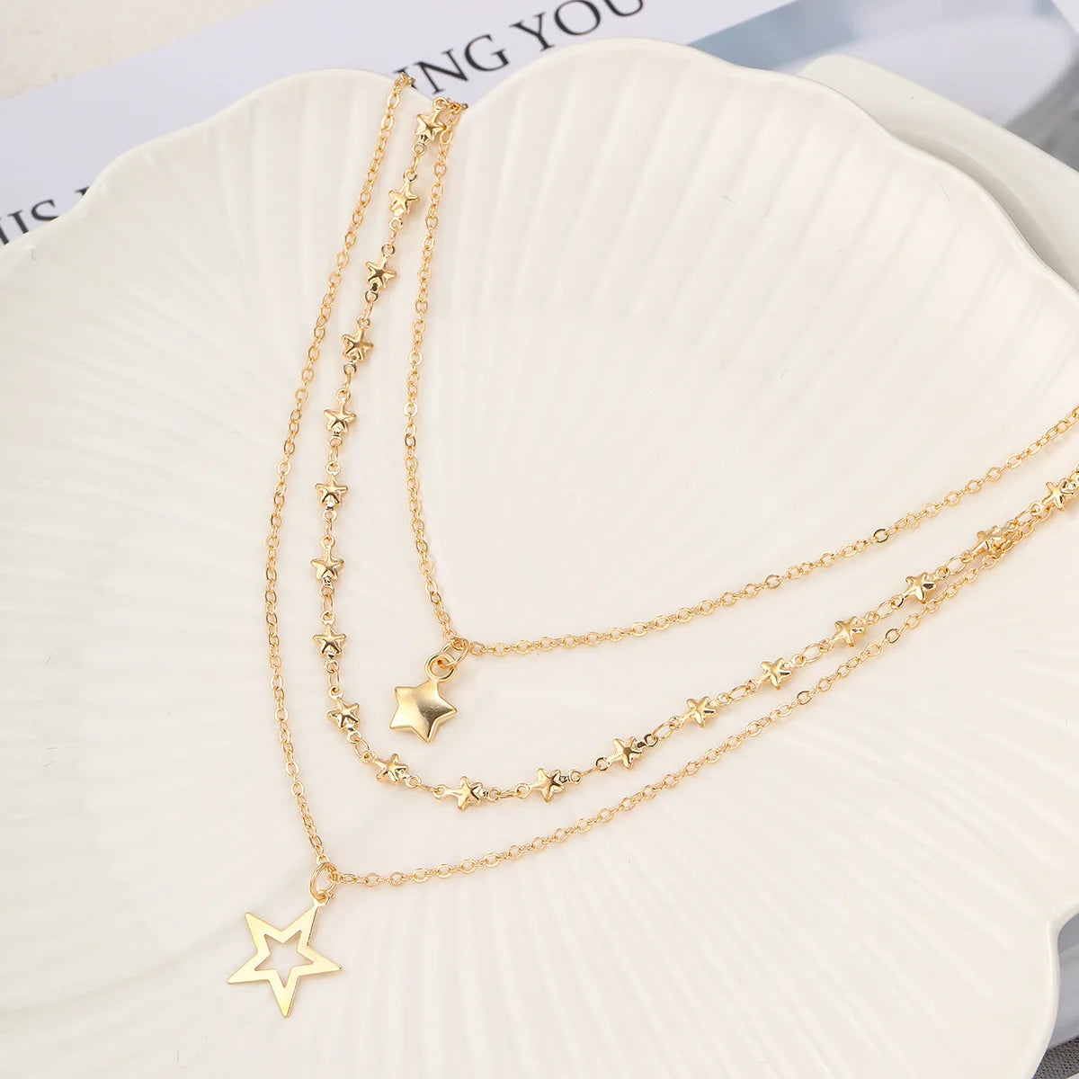 Gold star necklace