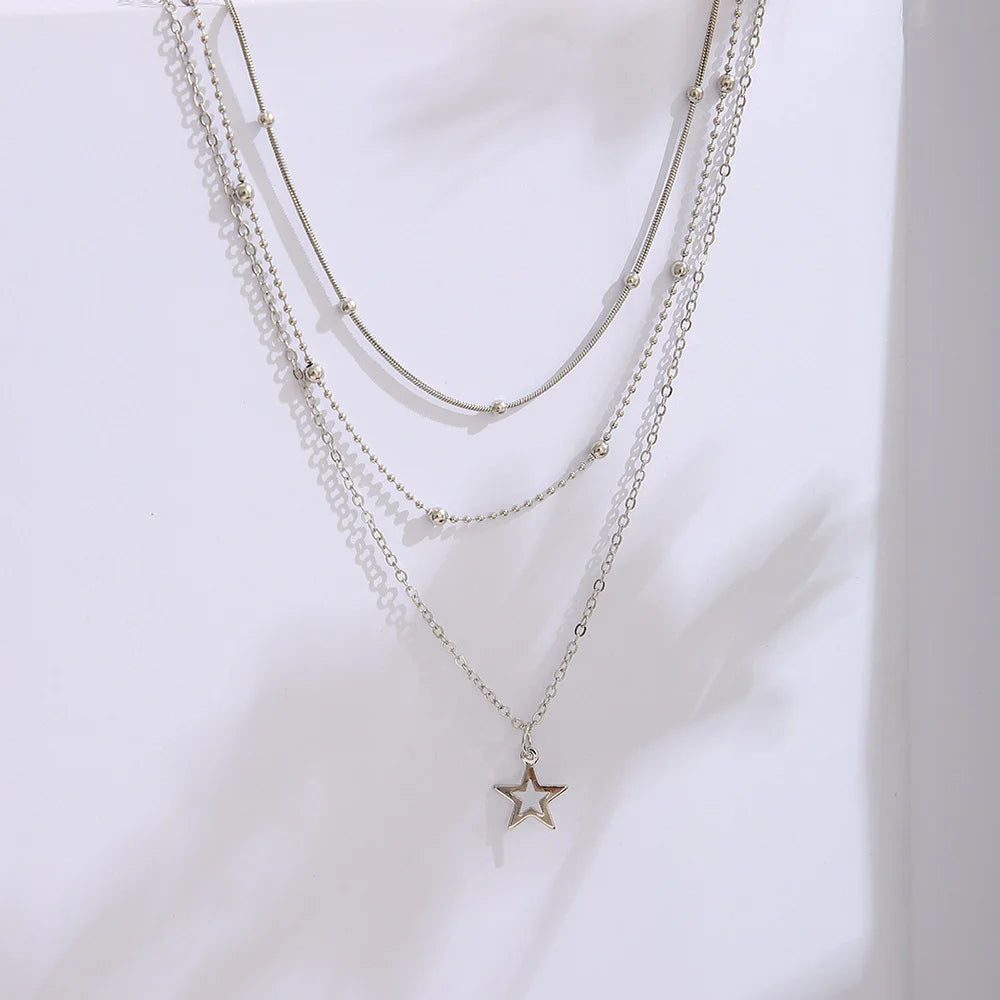 Gold star necklace